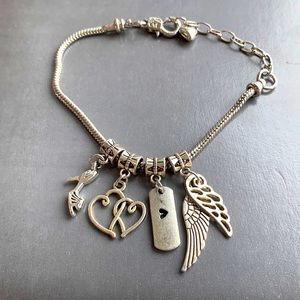Silver tone charm bracelet